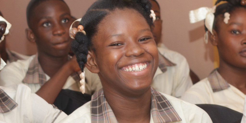 hopeforhaitis's tweet photo. In a world filled with challenges, we wanted to share a moment of light. Take a look at the tenderness and peace on this young girl's face, even though she lives in a country all too familiar with hardship. 🌼 #givehope #bringpeace #sharejoy https://t.co/ow1w1DP71z
