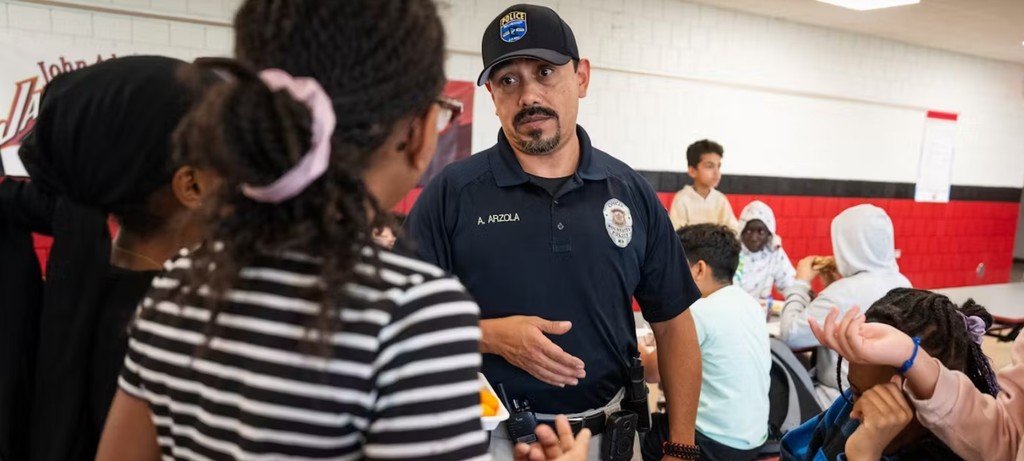 The  Star Tribune Newspaper was at John Adams Middle School interviewing and shadowing our School Resource Officer: Officer Arzola.  Here is the article:

startribune.com/whats-it-like-…