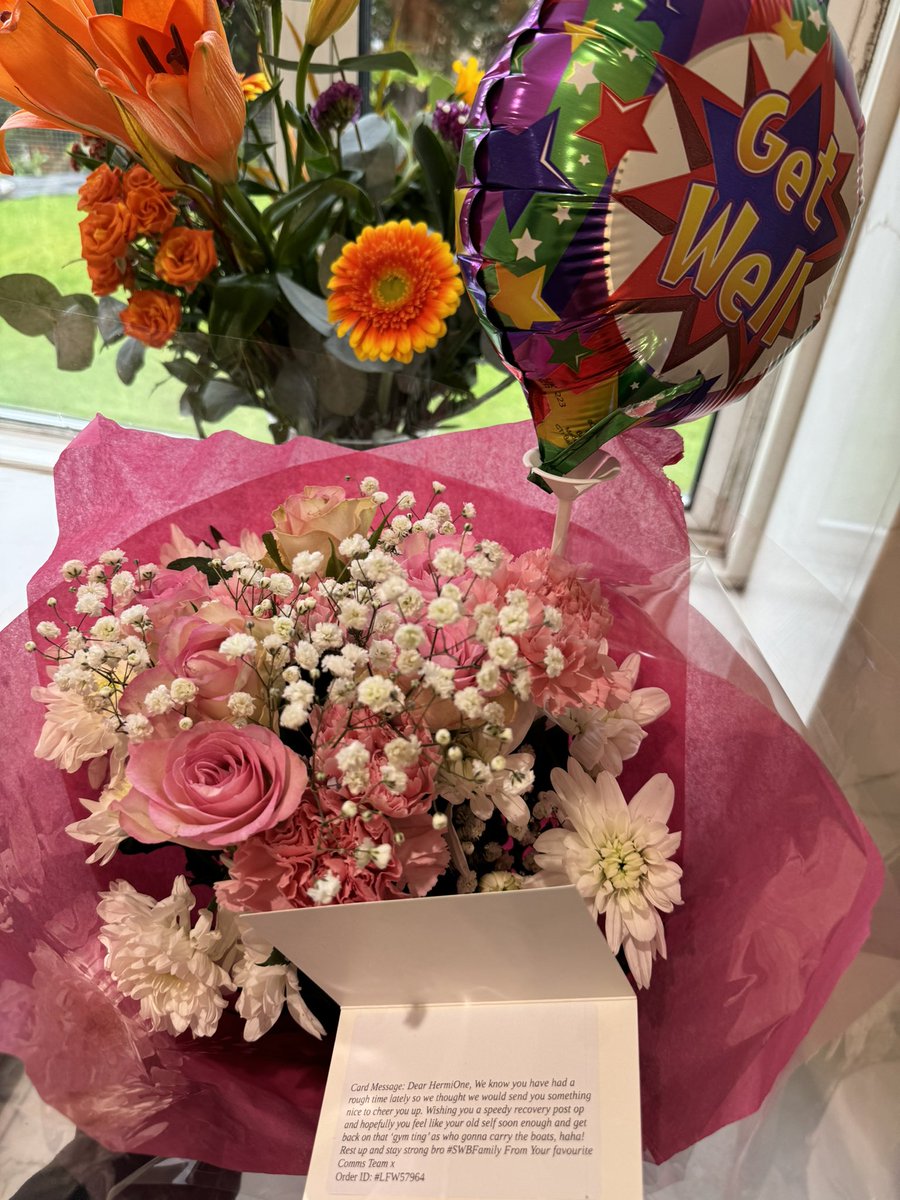 HermioneCrump's tweet photo. Definitely feeling the post surgery blues, but these gorgeous flowers from my fellow comms team brought a smile to my face this morning. #SWBFamily for sure ❤️ https://t.co/1qEQaNqLPn