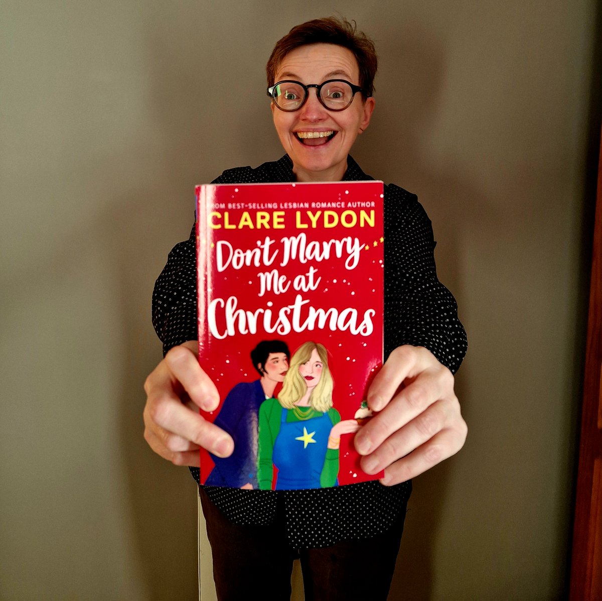Look how excited I am about my new book, Don't Marry Me At Christmas! Available on Kindle, KU and in paperback. Read it and get excited, too! Get it here:  mybook.to/dontmarryme #lesbian #lesfic #lesbianfiction #lesbianromance #sapphic #queer #wlw