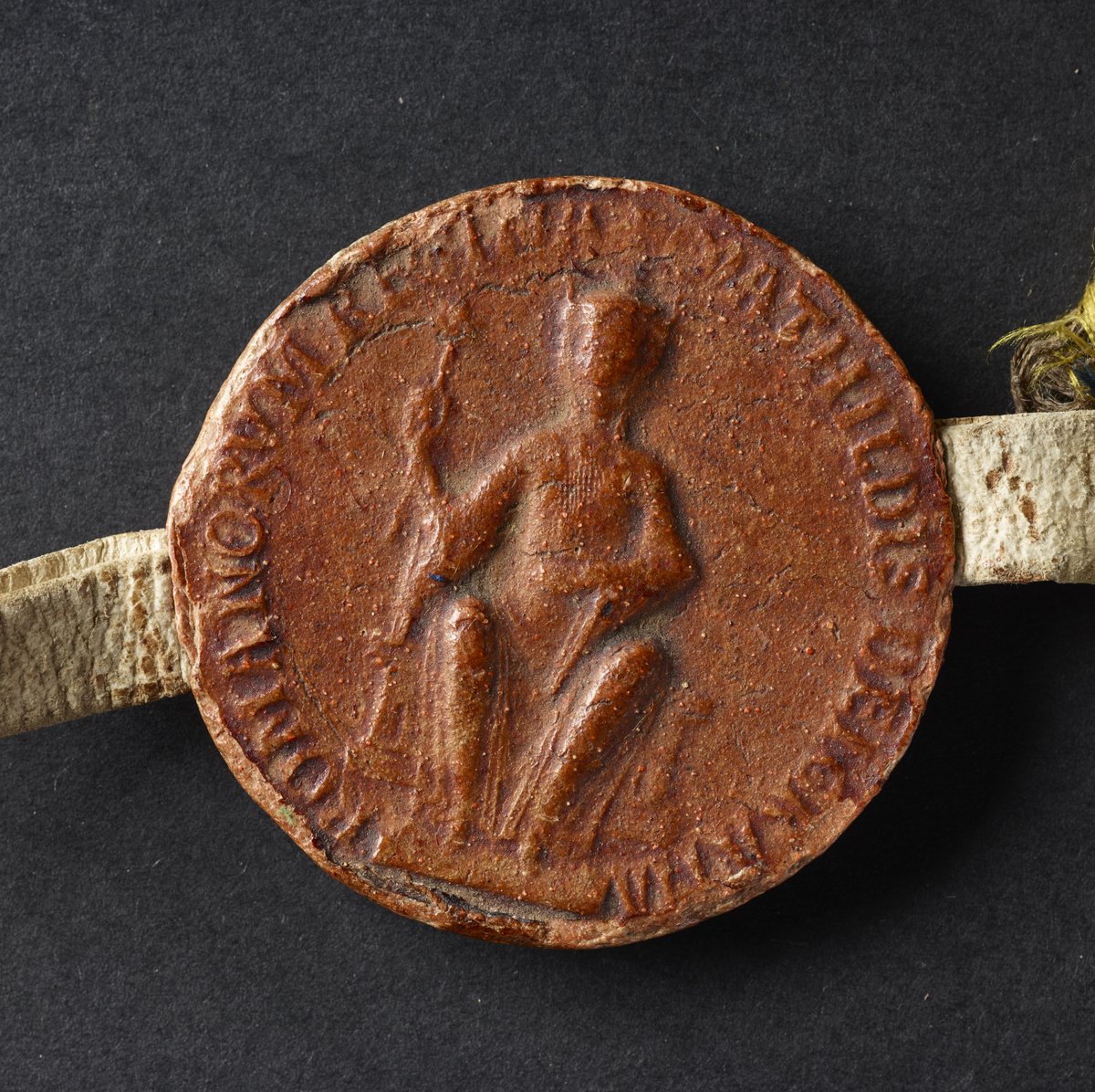 The seal of Empress Matilda, enclosed in its own beautiful silk seal bag. 

You can see it in person in our Medieval Women exhibition! 

blogs.bl.uk/digitisedmanus…