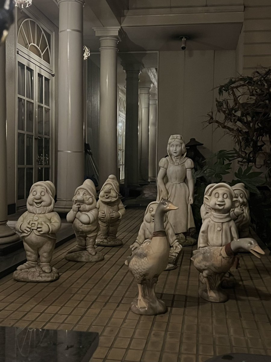 holy fuck i just walked past this terrifying sight in this hotel courtyard to get to my room. i think i’m going to be murdered in my sleep by snow white and the seven dwarves