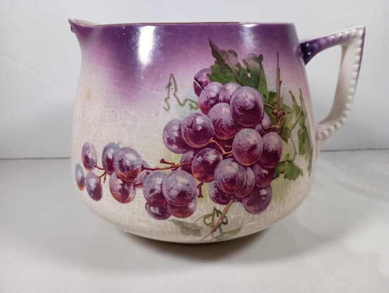 Antique Dresden China Water/Lemonade Pitcher with purple grapes, wonderful shabby pitcher for Farmhouse decor or shabby flower vase.
etsy.com/listing/179580…
#mamboteam