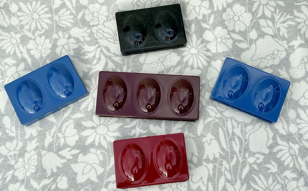 A few recent palettes..Clockwise from the top - Standard Black in a gloss finish opposed to the standard Black matte finish. 
Classic RAL 5010 Gentian Blue. 
Classic RAL 3004 Purple Red.
Classic RAL 5000 in Violet Blue. 
In the middle - Standard RAL 3007 Deep Maroon.
#Watercolour