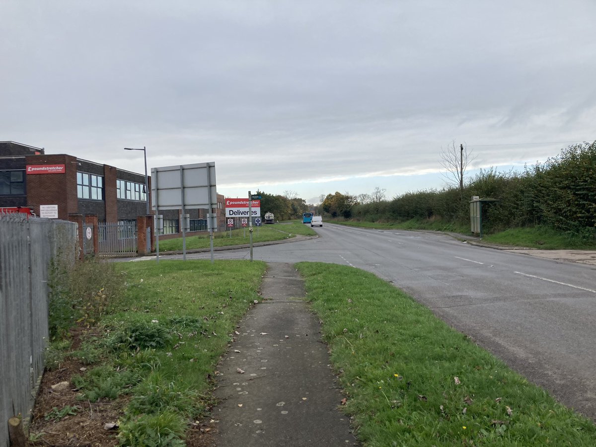 Not all of this journey involves connections with nice Costas or a McDonalds to wait in. The change from 153 to 28 involves standing by a busy road in the middle of nowhere. Only thing of note is the HQ of Poundstretcher. #LeicestershireLoop