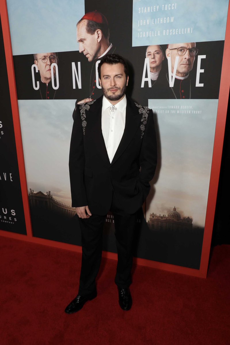 cameronmoir's tweet photo. Conclave —a deep dive into tradition, power, and secrecy, and a @McQueen jacket that dazzles like stained glass. Shoes by @BrunoMagli #Conclave #conclavefilm #AlexanderMcqueen #brunomagli https://t.co/ESfdgqOwpX