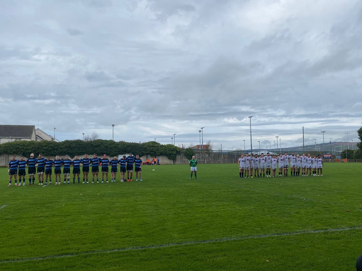 A minutes silence for recently deceased members Maurice Mossie Burke and John Ryan