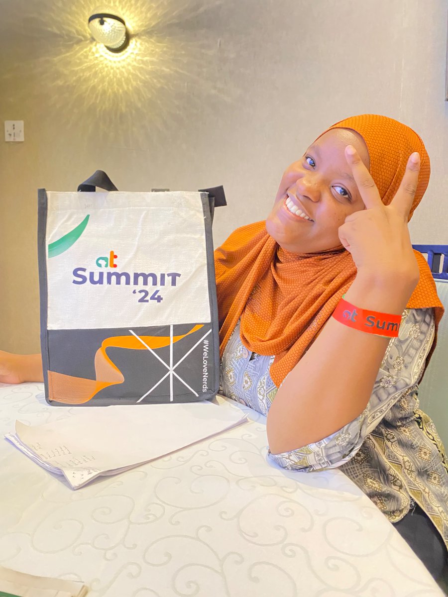 lailah_grant's tweet photo. A big thank you to @Africastalking for the awesome tote bag! I’m absolutely loving it—perfect for carrying all the great ideas from #ATSummit24! Your thoughtful gesture made my day, and I can’t wait to keep building with AT. #BuildWithAT #WeLoveNerds #InnovatingAfricasFuture https://t.co/XFAIPK6KQ1