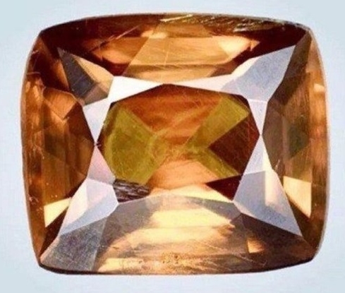 The14News's tweet photo. The rarest gemstone on Earth, known as kyawthuite, is an extraordinary, transparent, orange-red mineral with only one confirmed specimen, housed at the Los Angeles Natural History Museum. #rarestgemstone 
https://t.co/XmRyktVYur https://t.co/KoeiooeKla