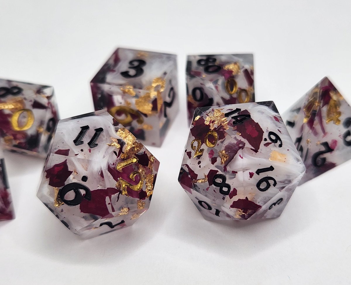 Sinnamon_Dice's tweet photo. Tragic Lovers Dice Set • Available later today
#dnd #ttrpg #handmadedice #dice #dungeonsanddragons https://t.co/lEsi2LafbO