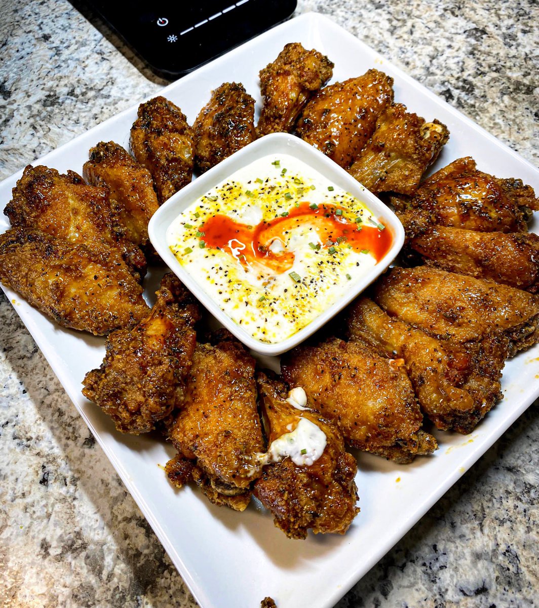 hot lemon pepper wings with a spiked ranch >