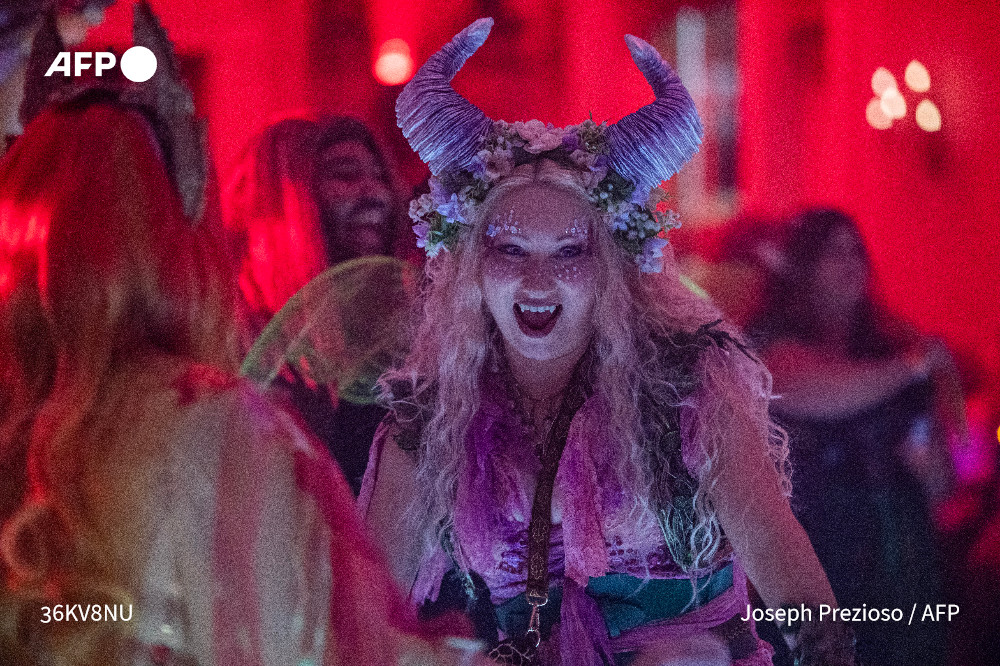 Revelers take part in the Salem Witches' Halloween Ball in Salem, Massachusetts