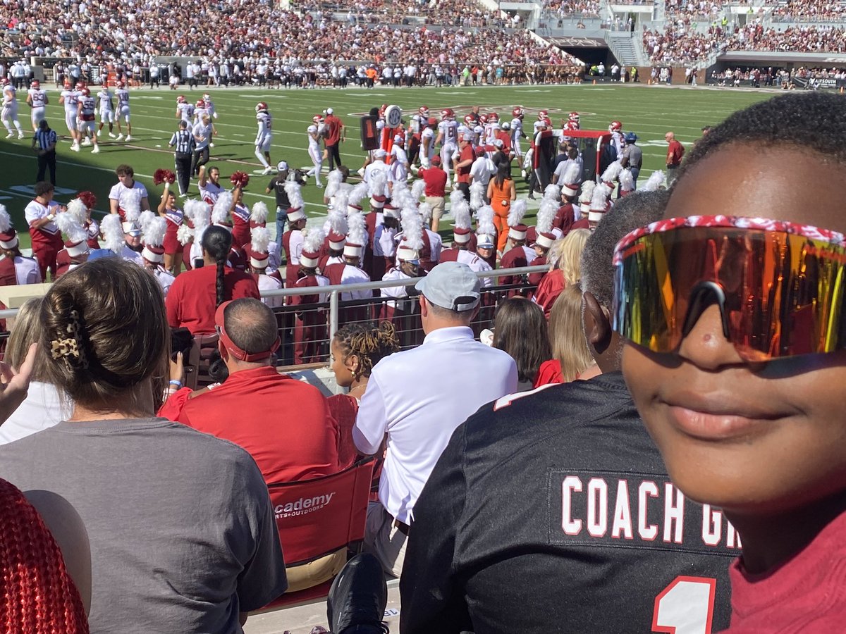 Best time ever! Band &amp; bells ringing &amp; we are winning! Touchdown right here. Mama he looked like he scored in my lap. So much fun! Means a lot to see your baby boy smile again when he has lost so much. He feels so responsible for not being able to save his brother. This day is 😇