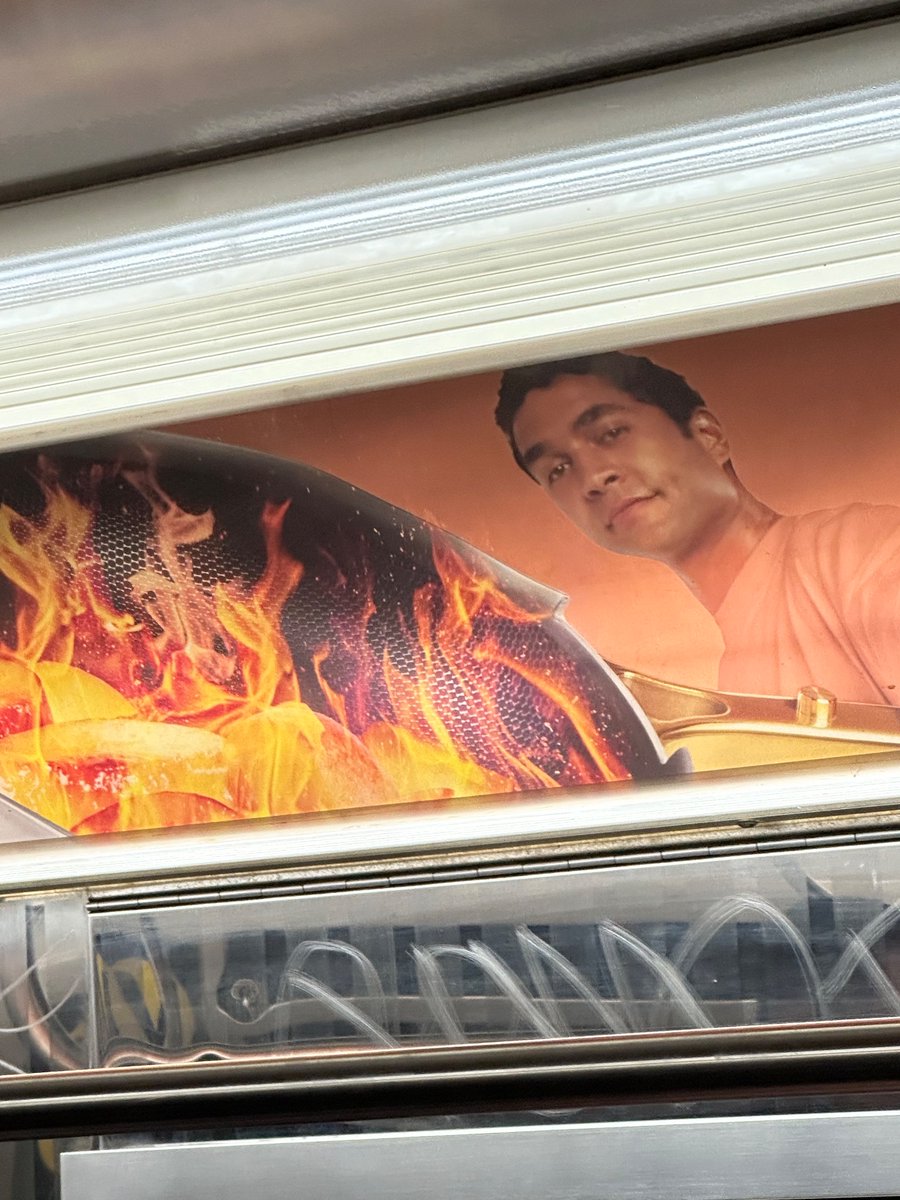 What is he cooking 
Apples?