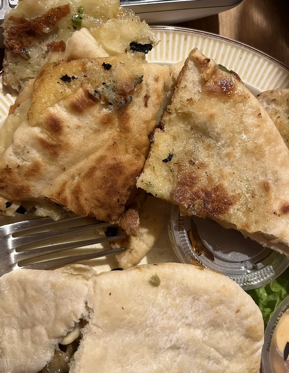blubirdis's tweet photo. @NandosUK had been really looking forward to the new cheesy pitta but after they were delivered 45 minutes late they didn’t look as appealing as advertised, with tough cheese and stuck together, alongside this my NHS discount wasn’t applied, very disappointed. https://t.co/X0zBJ7D7t2