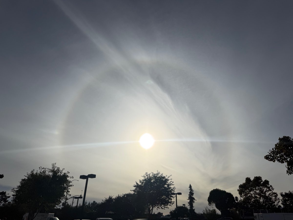 Cool human moment: older gentleman stopped me in parking lot and asked if I was interested in hearing about the rare atmospheric conditions at play right now in Santa Cruz. This is something called a “sun dog”. Glad I slowed down to listen! #CirclesAroundTheSun