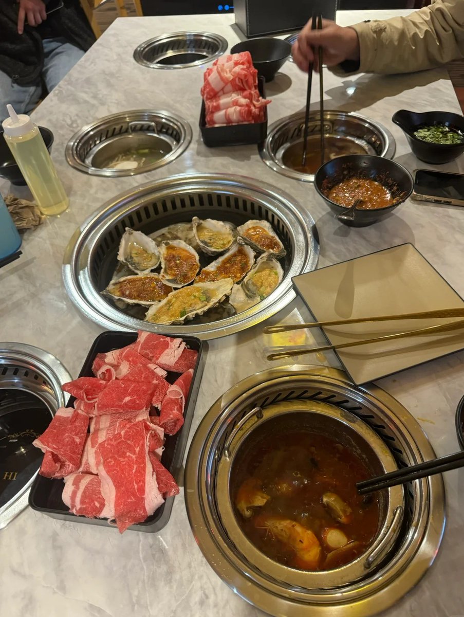 Hot pot nights are the best nights! Bring on the flavors! 🔥🍜 #FoodieFriends"
"Savoring every moment and every bite! Cheers to friendship and hot pot! 🍲