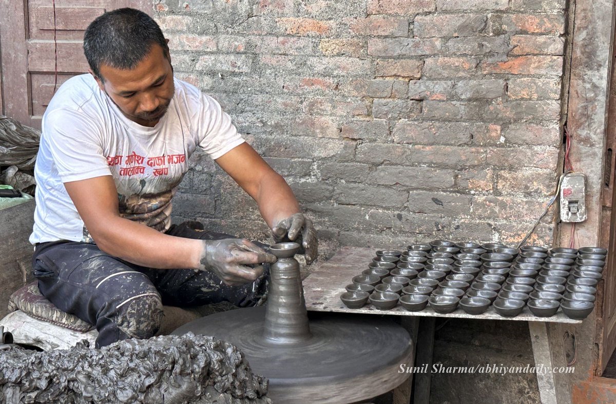 newbusinessage's tweet photo. These photos by our photojournalist @sharmasunil1905 show the community of potters busy making the traditional oil lamps at Bhaktapur’s #potterysquare on Saturday, October 26, 2024. https://t.co/9psBqOxkIO