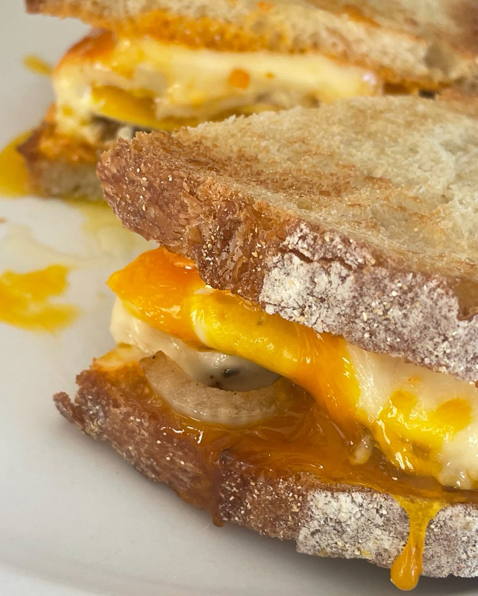 montanakind's tweet photo. 🌟 Whispers I just found out that if you play "Sweet Caroline" backwards, it's actually a recipe for the perfect grilled cheese sandwich. 🧀🎶 #ViralSandwich #SweetCheese https://t.co/tjbKMLHgBS