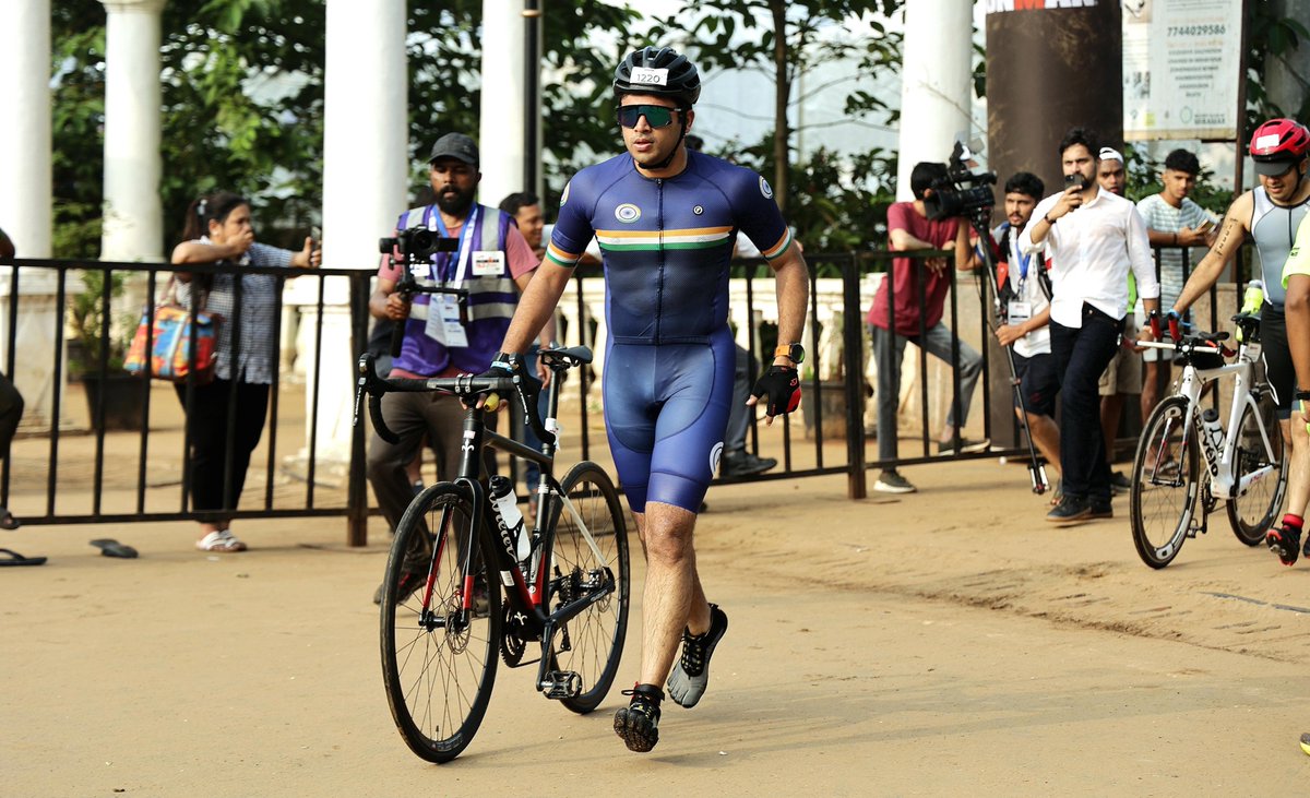 Tejasvi_Surya's tweet photo. The Ironman 70.3 Goa, known for attracting athletes from over 50 countries, has become a premier event for athletes and fitness enthusiasts in India and across the World. 

The challenge involves a 1.9km swim, a 90km cycling segment, and a 21.1km run, covering a total distance of 113km. This is the ultimate test of one’s endurance, and physical and mental fitness.  

Over the last 4 months, I have trained rigorously to improve my fitness and as a result, am happy to share that I have completed this challenge! 

The inspiration itself goes back to #FitIndia initiative kickstarted by PM @narendramodi ji, which helped me reflect on my fitness goals. As a young nation chasing big ambitions, we must nurture our physical fitness and become a more healthier nation. An endeavour to become fit also makes you more disciplined and confident, which improves chances of your success in any venture that you undertake. 

#FitIndia movement goes a long way in increasing this awareness and bringing more people on to fitness routines, that’s so essentially needed for our nation! 

As a finisher in this daunting challenge, I can attest to the young folks that fitness goals really push your boundaries, and make you a better individual. I appeal all fence sitters and perpetual planners to hop onto this journey and make progress!