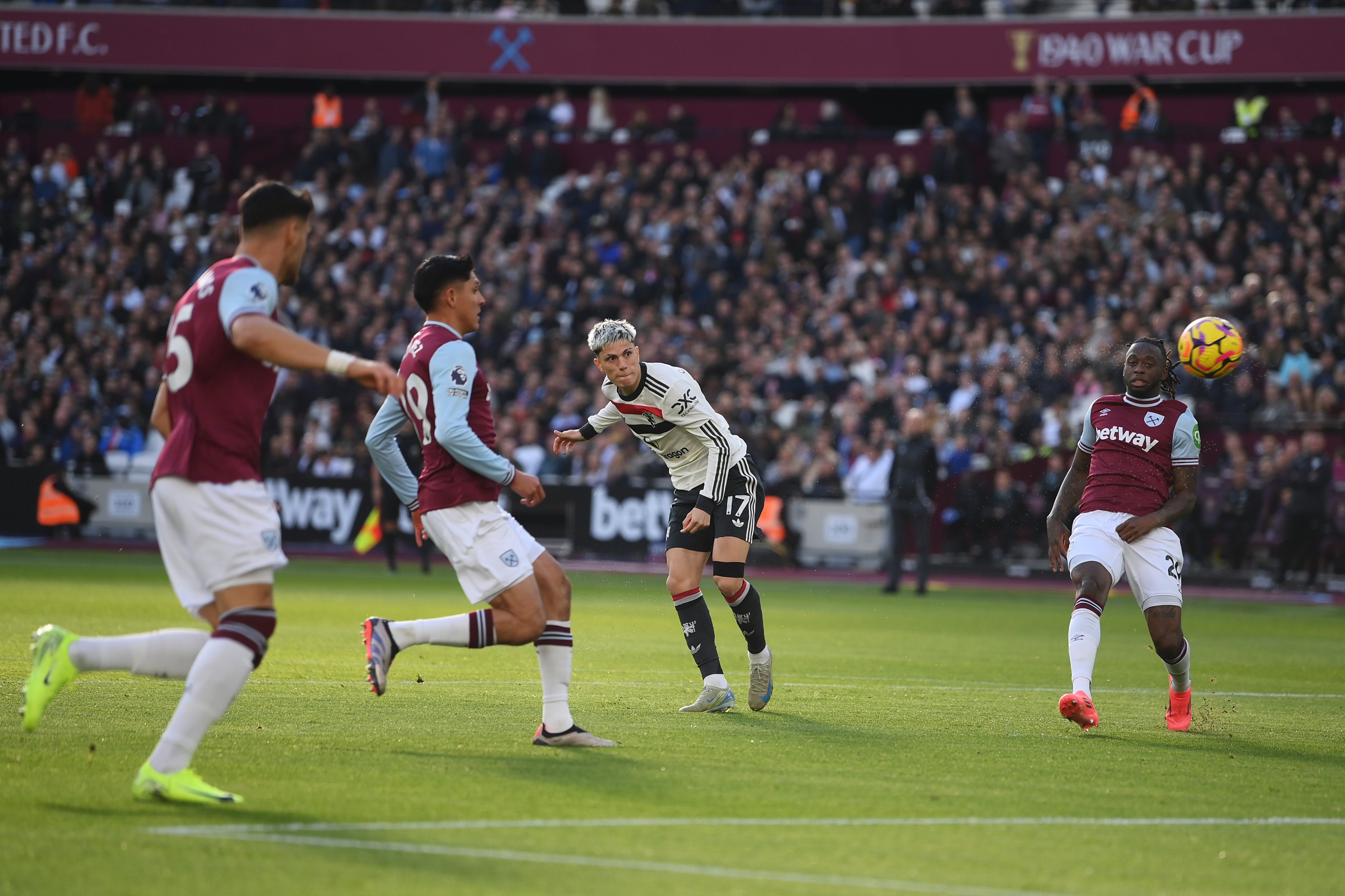 Alejandro Garnacho fires a shot at goal.