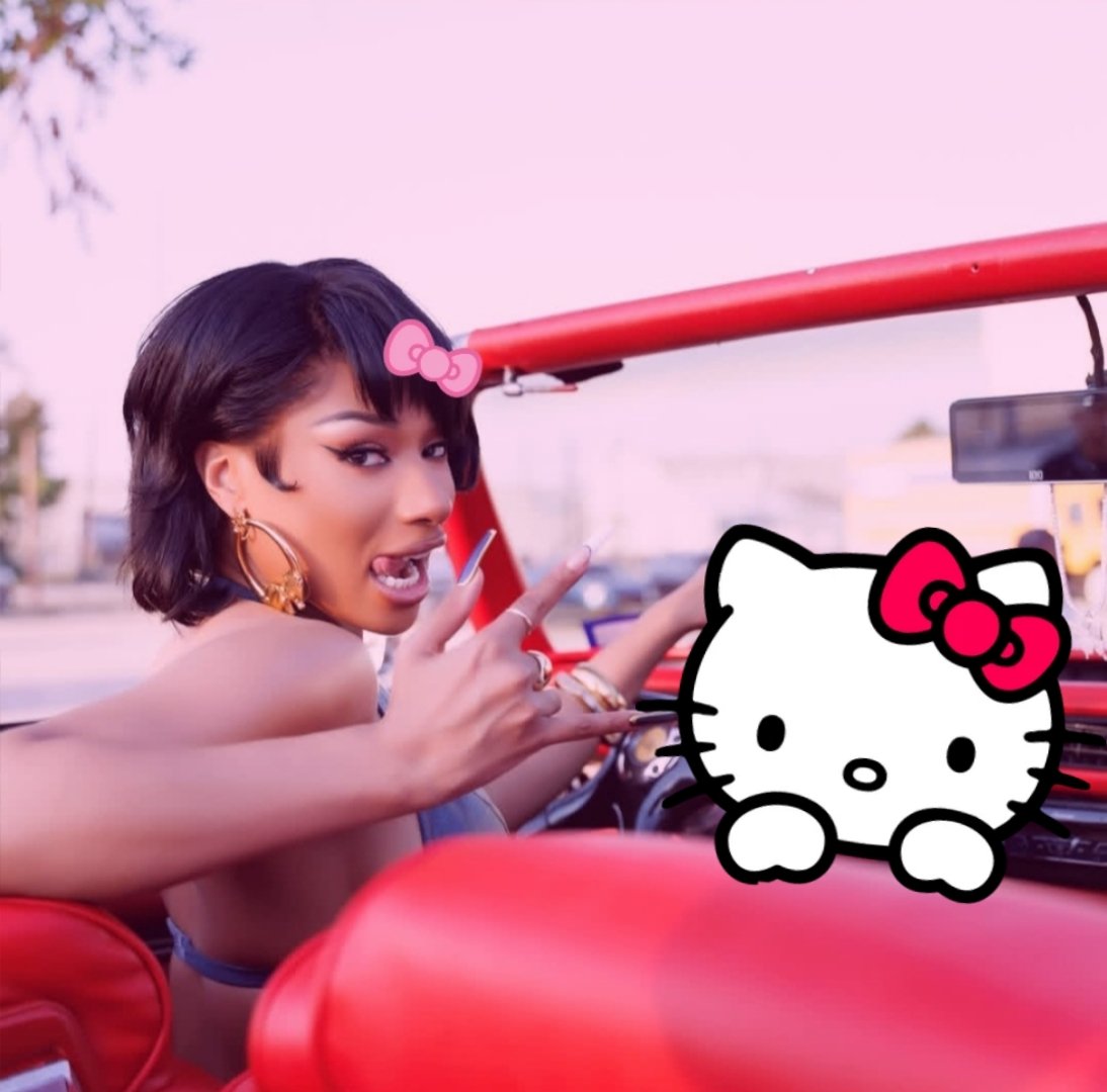 sanriohottiee's tweet photo. megan driving with hello kitty in new photo https://t.co/oEzPMzYzHA