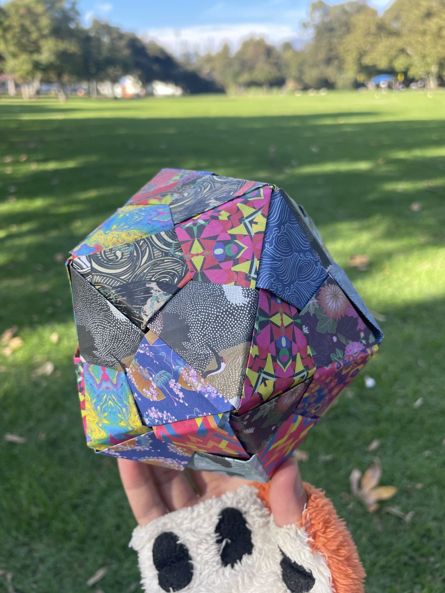 PonyFreelancer's tweet photo. Folded an origami d20 at my 1st ever furmeet! Also got Free drawn by @KarmaUsedCurse (Thank you!) https://t.co/qmuPwUT5VM