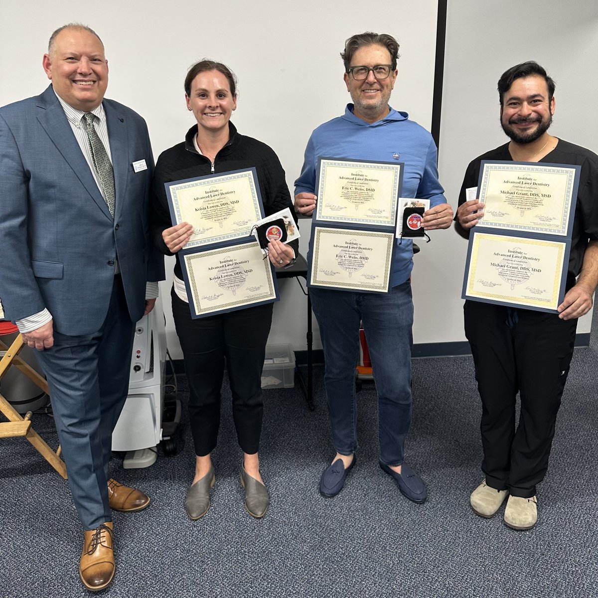 docperio's tweet photo. 🎉Kudos to new fully certified LANAPers, Drs. Kuhns, Weiss, &amp; Grant receiving their certificates &amp; challenge coins with Certified Instructor, Dr. Kirk Noraian.  Let there be light, laser light that is. #perioimplantinnovations #arrowstudyclub #toothtalks #LANAP #drkirksvlog 🦷✨ https://t.co/n5R4gWDUwW