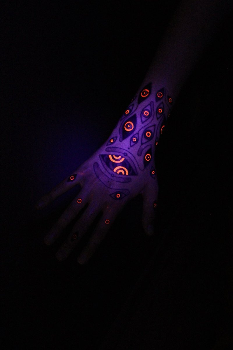 noodledead's tweet photo. glowing hand tattoos 👁️ https://t.co/Miit6GxTdw
