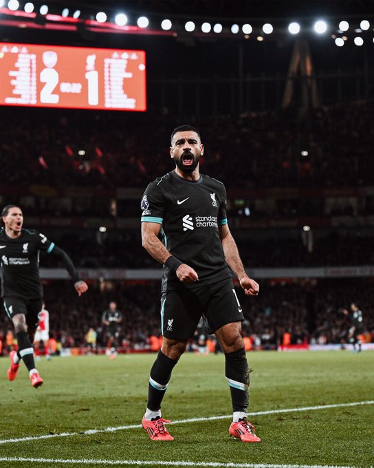 Photography of Mo Salah celebrating his goal against Arsenal.