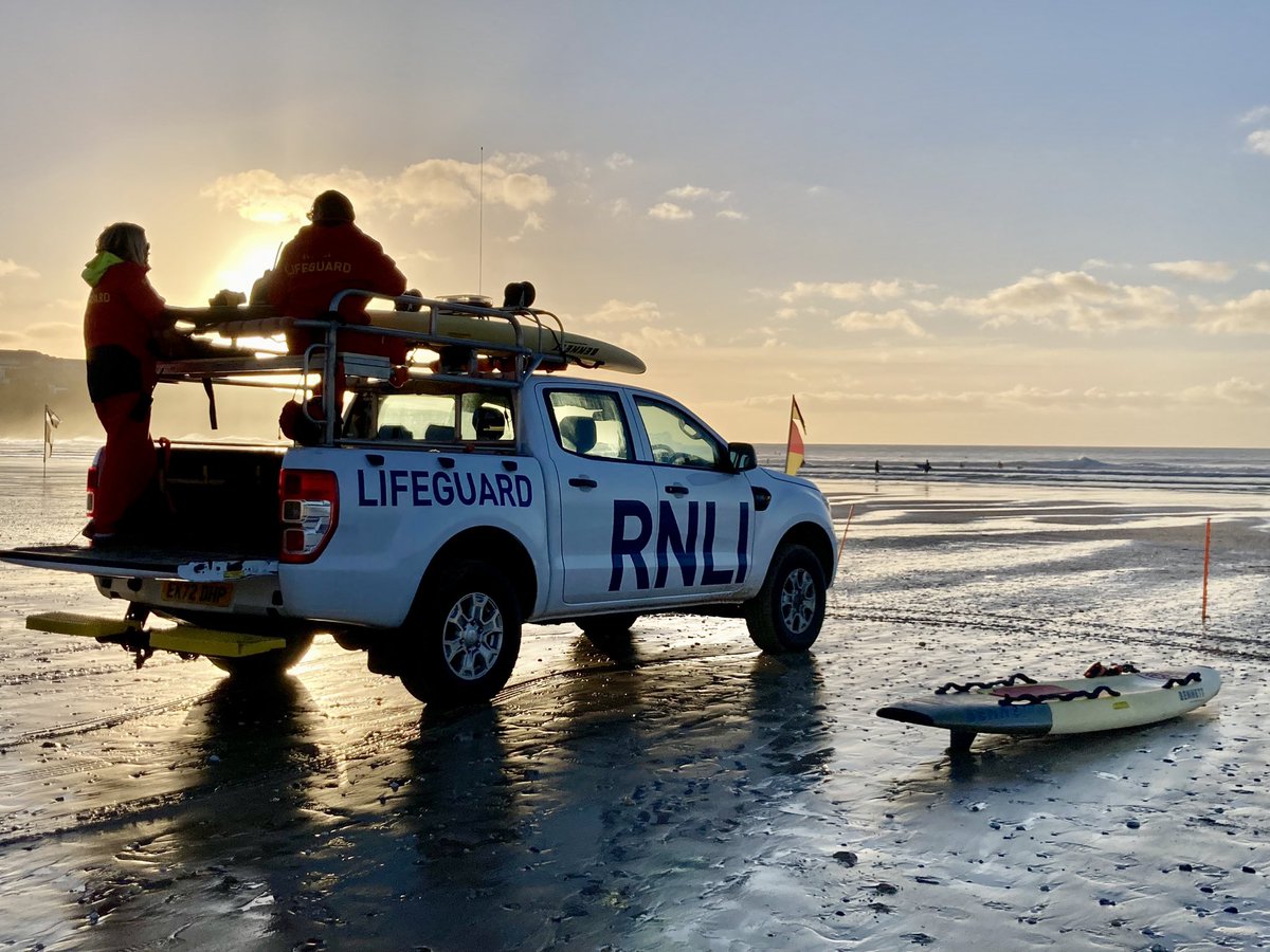 Fistral beach sunset with the RNLI