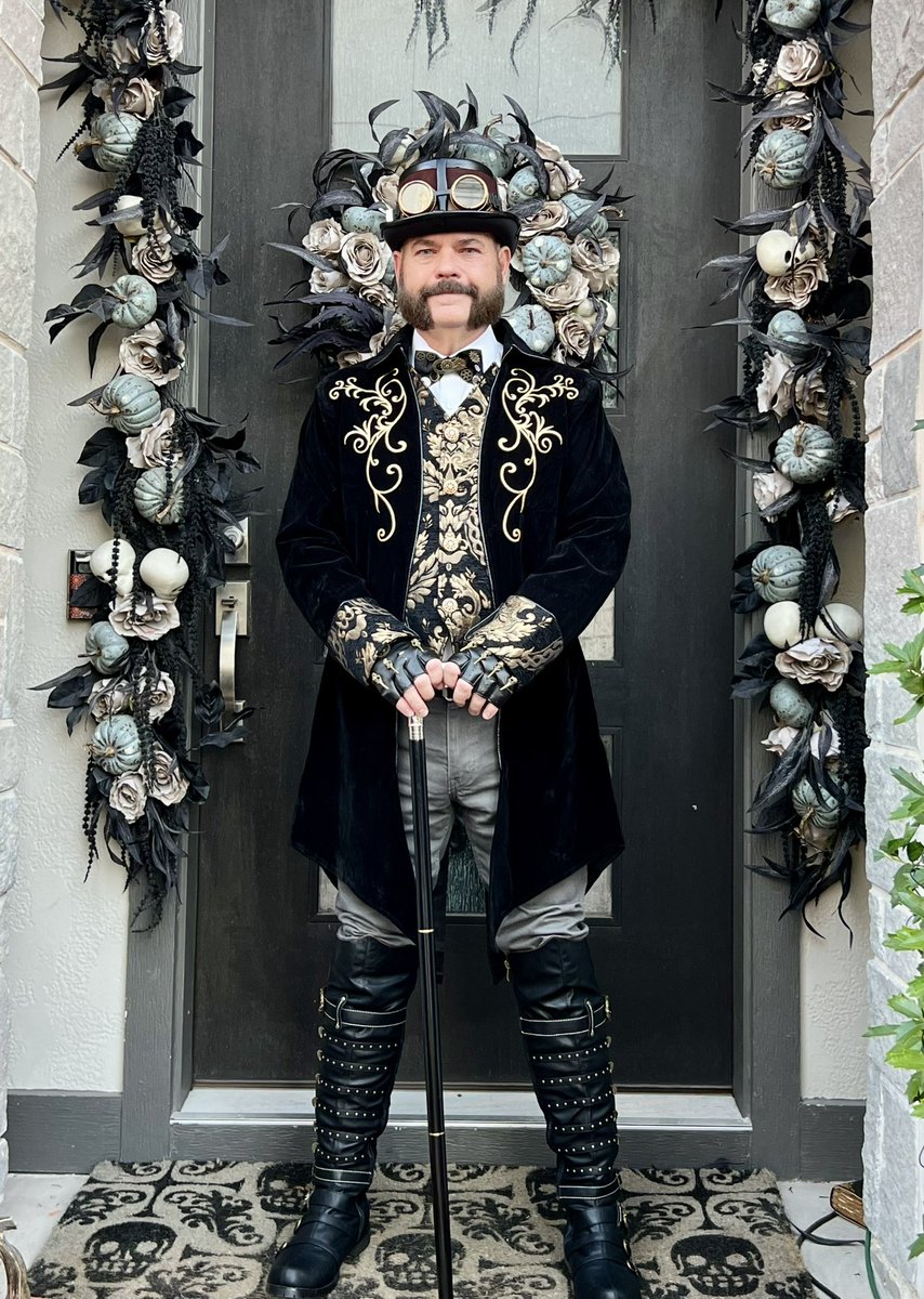 Steampunk realness last night. I went as Edgar Allan Hoe. The Partner In Crime as a mutton chop dandy. #Halloween