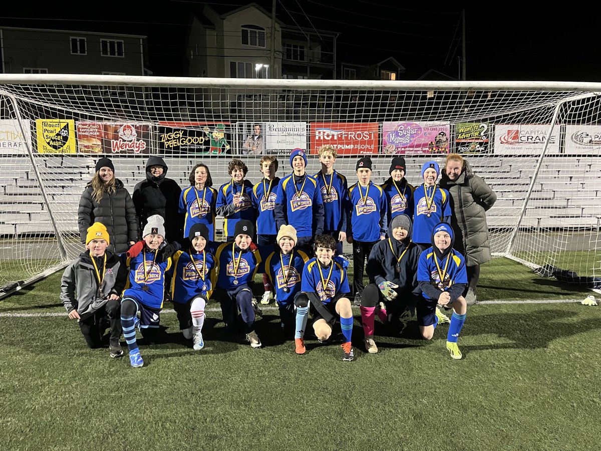 Grade 7 and 8 boys soccer team won the bronze medal in the junior high soccer league.