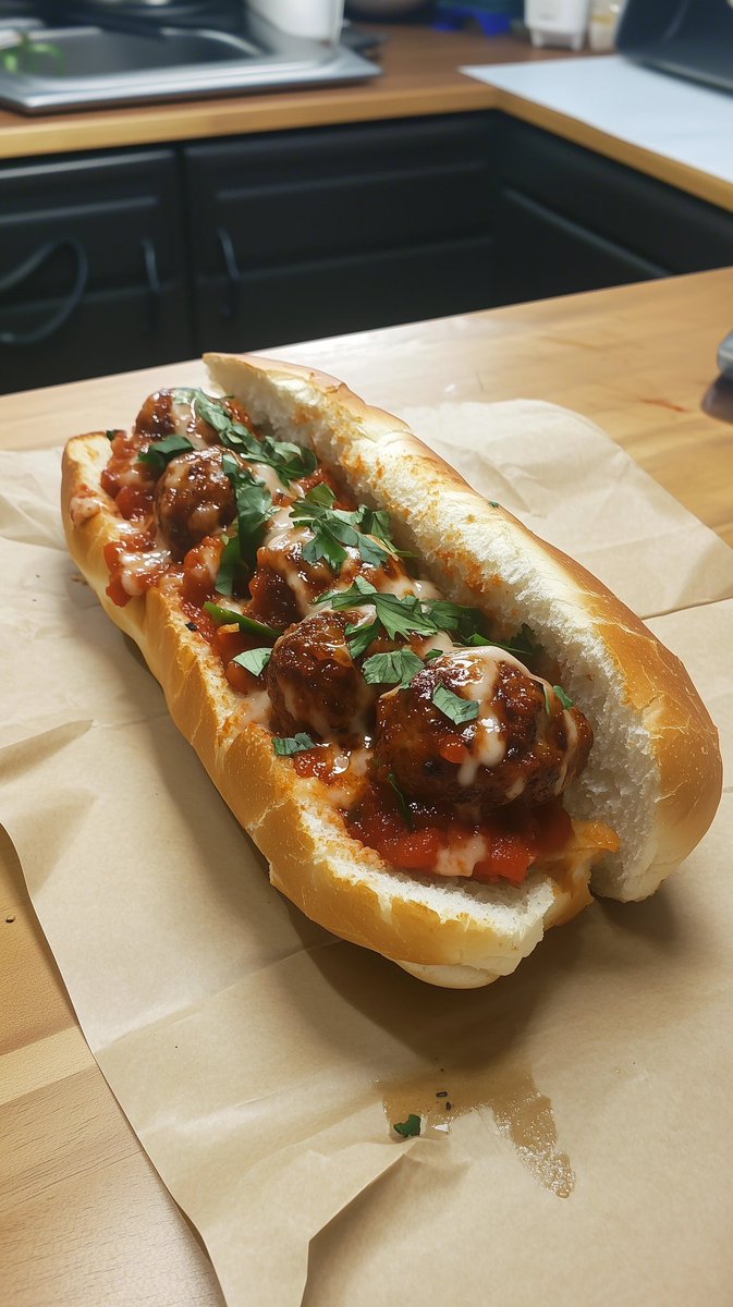 CyberVixenX's tweet image. Meatball sub perfection! 🔥 Juicy homemade meatballs swimming in marinara, drizzled with creamy sauce, and topped with fresh herbs on a perfectly toasted roll. This is what lunch dreams are made of! 🍖🌿 

#FoodPorn #MeatballSub #ComfortFood #FoodPhotography #Foodie