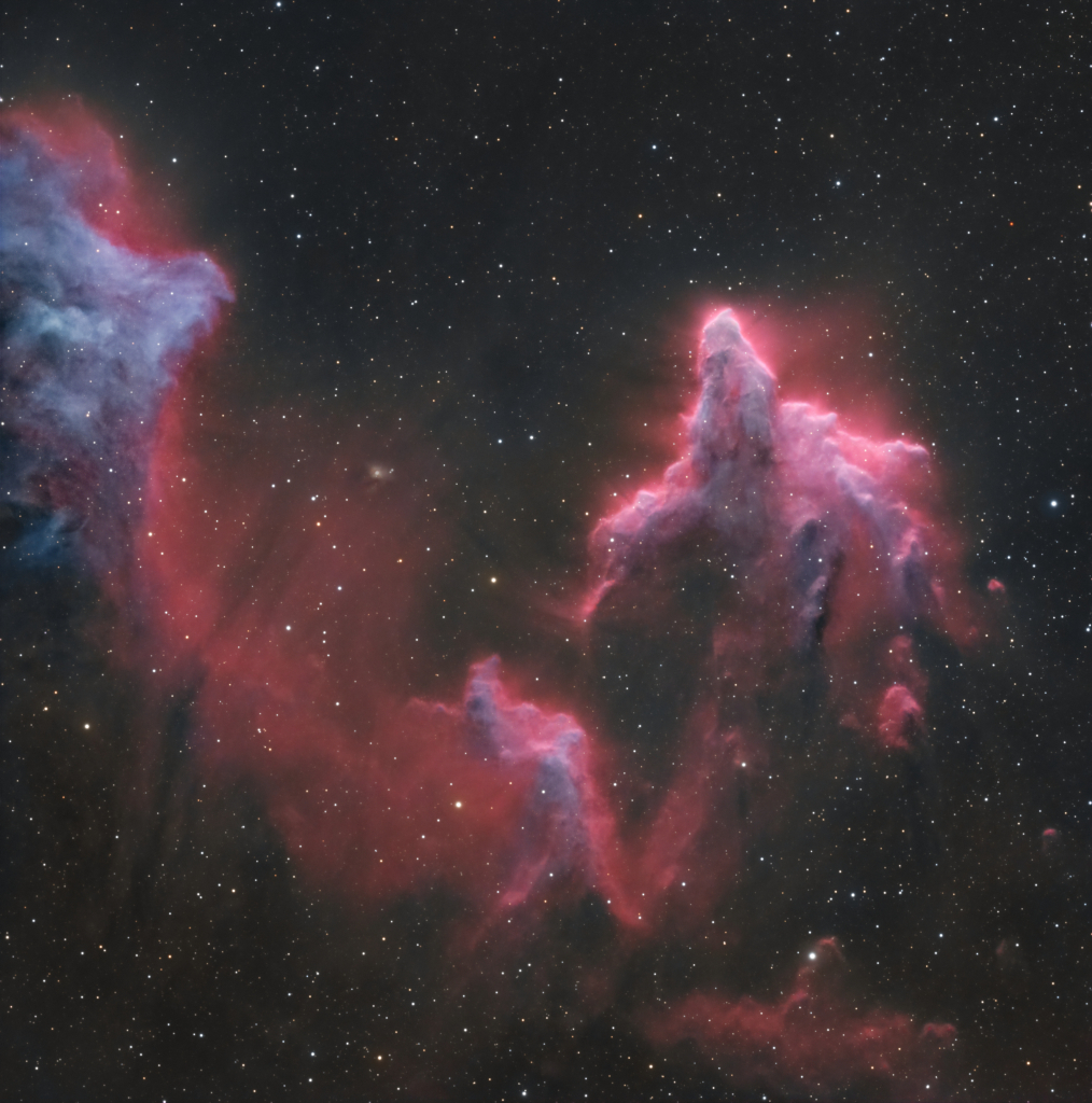 apod's tweet image. These brightly outlined flowing shapes look ghostly on a cosmic scale. A telescopic view toward the constellation Cassiopeia, the colorful skyscape features the swept-back, comet-shaped clouds IC 59 (left) and IC 63. About 600 light-years distant, the clouds aren't actually