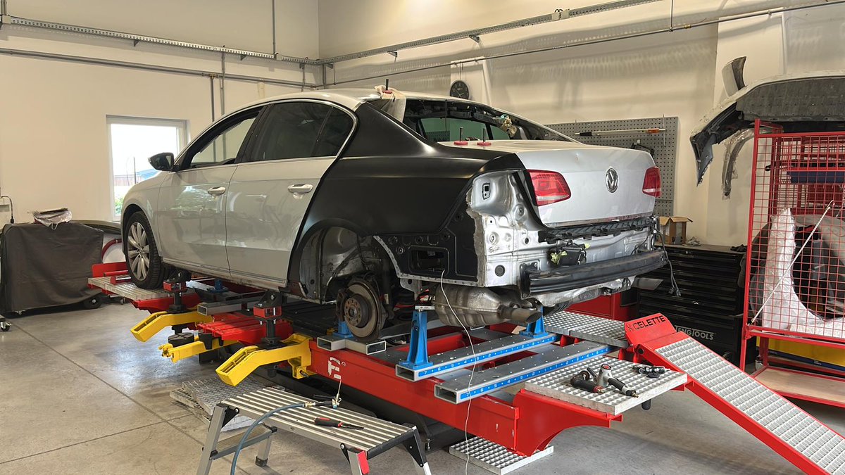 Celettegroup's tweet photo. This #Volkswagen #Passat is currently secured on a #Celette #framemachine and dedicated jigs just for this #VW, after sustaining collision damage to its rear. The specialized frame rack is being utilized to stabilize and support the vehicle during the repair process. https://t.co/q6KN577O2P