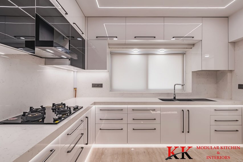 KKModularKitchn's tweet image. Behold the epitome of elegance! Our latest creation, a stunning white modular kitchen crafted with precision by KK ModularKitchen.

Anti-scratch Acrylic finish with grey glass accents adds style; Blum hardware ensures durability.
  
#BlumHardware #Kitchendesign