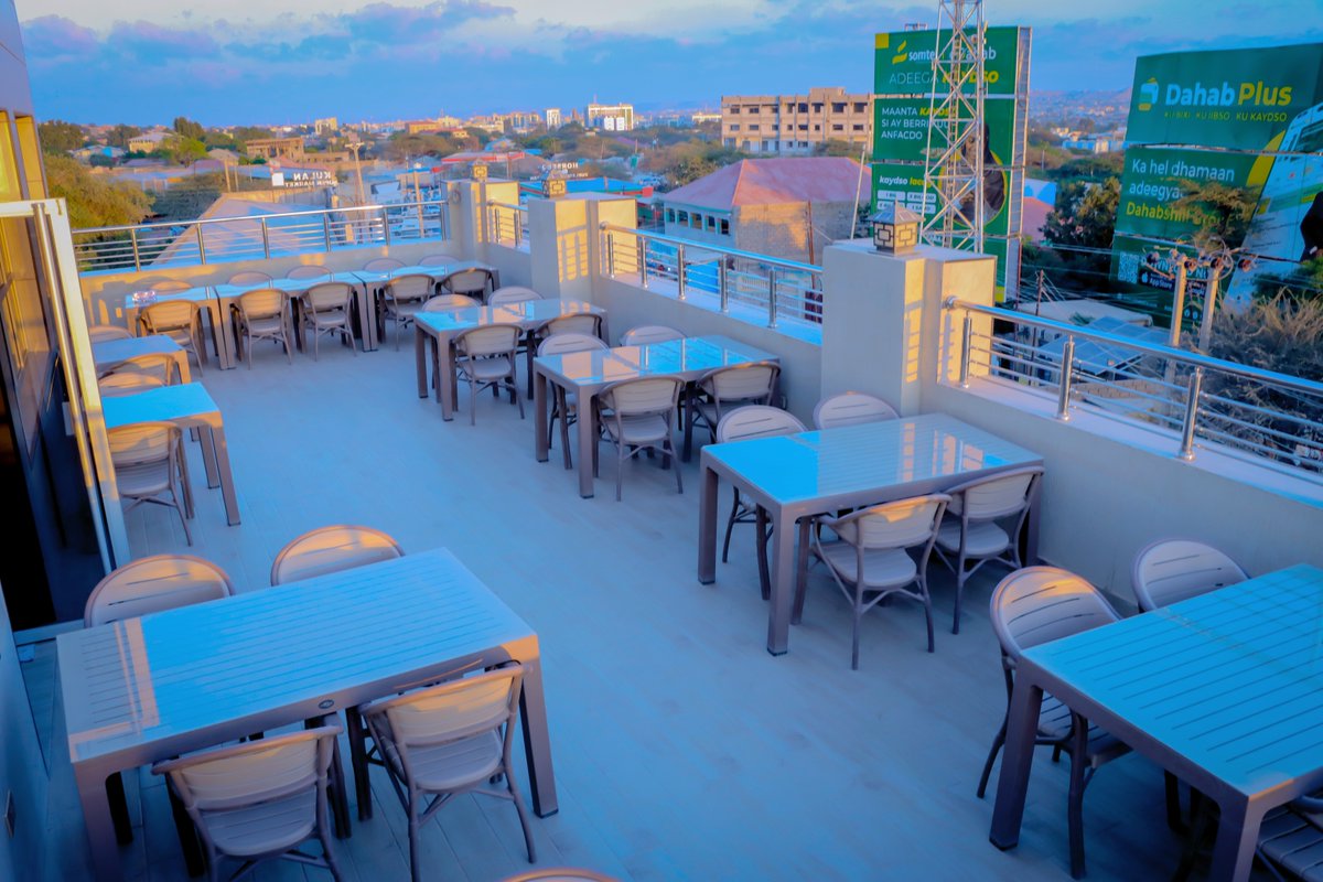 Jeeshotel's tweet photo. Indulge in stunning city views from the rooftop cafeteria at Jees Hotel. Enjoy a delicious meal or drinks while taking in the picturesque city skyline. Book your spot now and elevate your dining experience with the best views in town. 
#JeesHotel #RooftopCafeteria #CityViews. https://t.co/7IwguabFyi