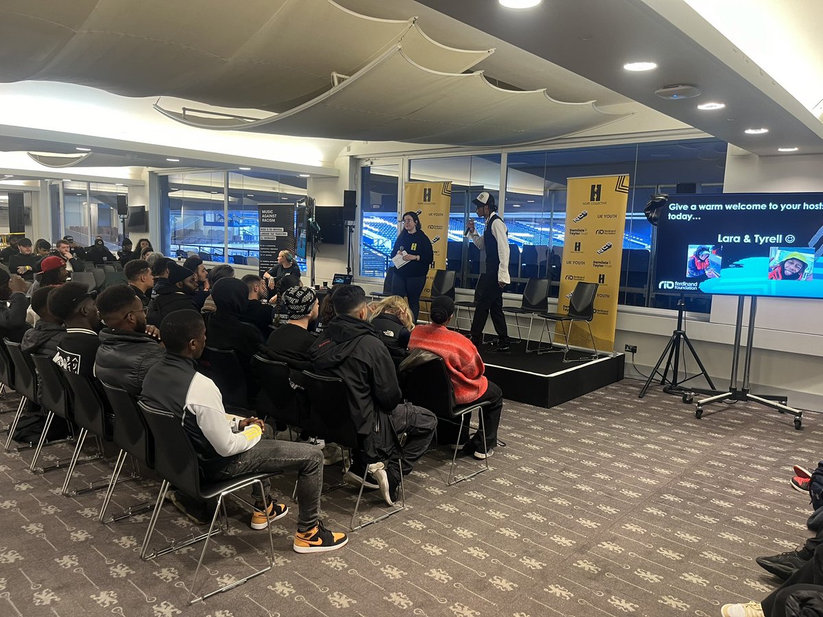 THE HOPE COLLECTIVE (@hopecollective2) on Twitter photo The Prospect Panther kicks it all off <a href="/MrProspect1/">Mr. Prospect</a> with <a href="/rioferdy5/">Rio Ferdinand</a> here at <a href="/ChelseaFC/">Chelsea FC</a> Stamford Bridge with <a href="/_PCFoundation/">The Paul Canoville Foundation</a> <a href="/riofoundation/">Rio Ferdinand Foundation</a> and anti racism movement <a href="/MAR_Education/">MusicAgainstRacism</a> Shout out our superstar YMG #HopeHack34 The Prospect Panther kicks it all off <a href="/MrProspect1/">Mr. Prospect</a> with <a href="/rioferdy5/">Rio Ferdinand</a> here at <a href="/ChelseaFC/">Chelsea FC</a> Stamford Bridge with <a href="/_PCFoundation/">The Paul Canoville Foundation</a> <a href="/riofoundation/">Rio Ferdinand Foundation</a> and anti racism movement <a href="/MAR_Education/">MusicAgainstRacism</a> Shout out our superstar YMG #HopeHack34