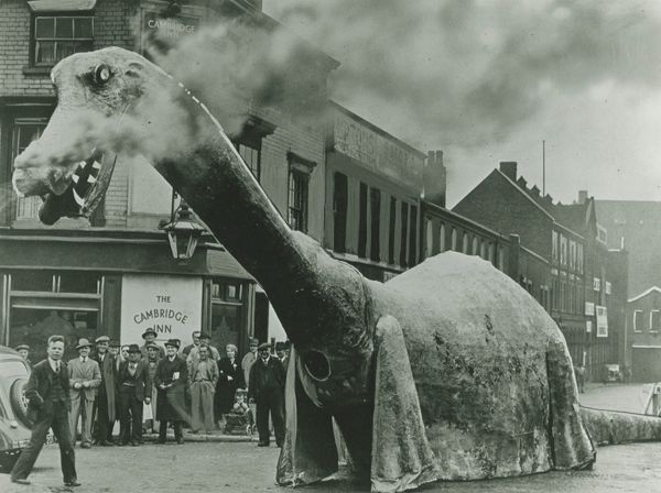 National Fossil Day seems like a great excuse to post about one of our favourite events in Birmingham's past - the 1938 Pageant of Birmingham when Egbert the dinosaur stalked the streets. Here he is passing very close to where the library now stands. (Ref: Misc Photos/Pageant)