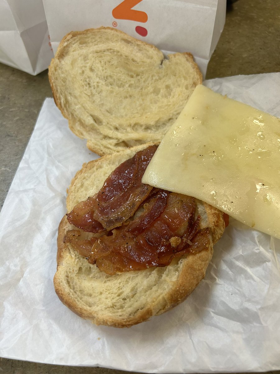 BlytheARoo's tweet photo. So disappointed with @dunkindonuts today! Ordered the maple bacon sandwich I get to work to eat my breakfast and this is what I got. Where the hell is the egg? Ugh! https://t.co/yFV4tjnHCd