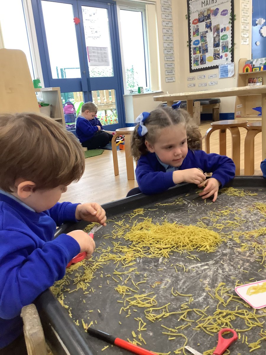 Nursery have been practicing our fine motor skills by cutting spaghetti in the tuff tray ✂️🍝