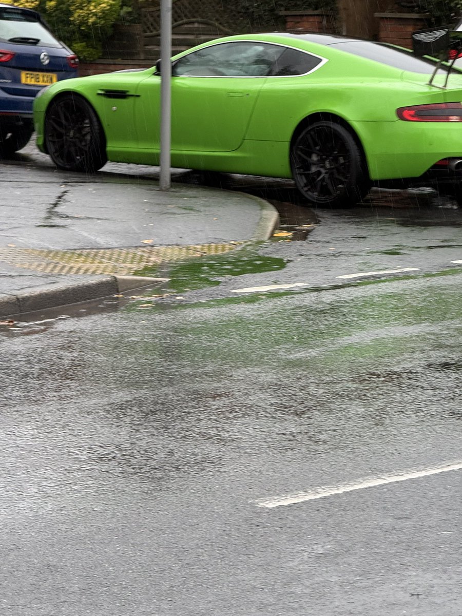 FormbyCrime's tweet photo. Saw two youngsters nearly get knocked over trying to cross the road in the pouring down rain attempting to get past this thing! How is this acceptable school parking?! I live nearby and this is a daily occurrence! @WoodlandsFormby @MerPolCC  @seftoncouncil  @SeftonLive #Formby https://t.co/WVC2pr3w5G