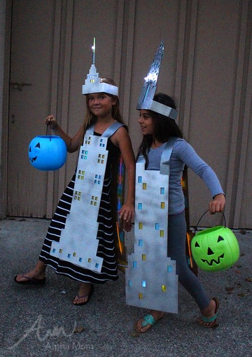 alphamom's tweet photo. This homemade Empire State Building Kid's Halloween Costume uses the "sandwich board" costume pattern.  Learn how to make your own following our tutorial: https://t.co/qEPQ74m6DV  What building landmark have you always wanted to dress for Halloween? https://t.co/P6afpLCjLJ