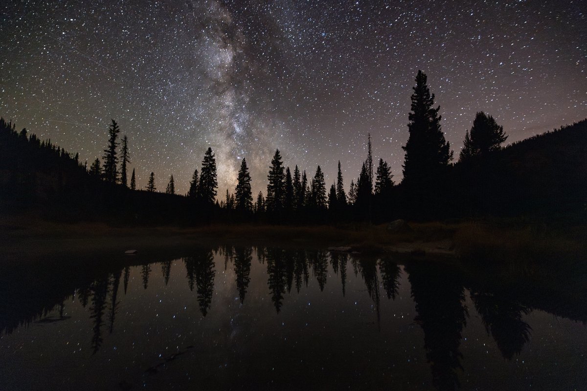 YellowstoneNPS's tweet photo. Did you know most of Yellowstone is free of artificial light?

On clear nights, stars fill the skies over the park, and the Milky Way is visible overhead from April through October each year. Sometimes, the aurora borealis makes an appearance too!

To preserve nighttime wilderness and the daily light-dark cycles necessary for maintaining human health and wildlife activity, we have replaced light fixtures in developed areas of the park with low wattage, energy efficient, fully shielded fixtures that direct light downward.

If you plan to stargaze and explore the park at night, be sure to bring flashlights, some friends, and bear spray!