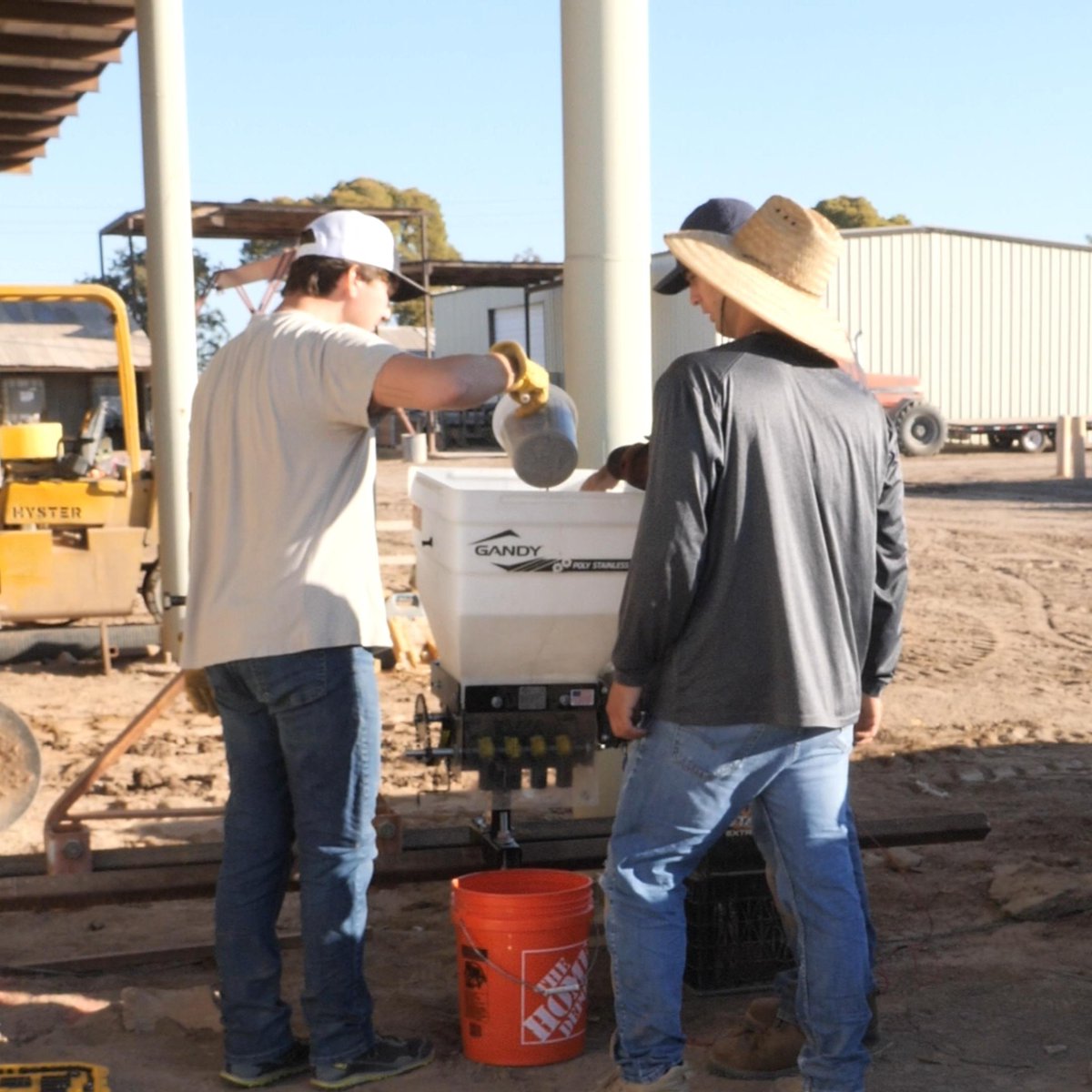 Ag students at Yuma Cooperative Extension are prepping a metered fertilizer machine for field trials at Yuma Agricultural Center, aiming to boost efficiency and sustainability. Proper setup is key to success!