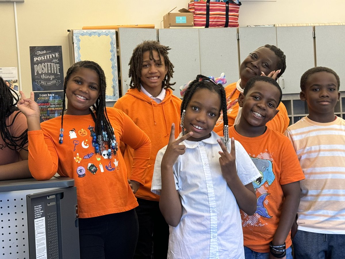 MiddleMarquette's tweet photo. Marquette Scholars shine bright, united in orange on Unity Day. https://t.co/voiowclnSB