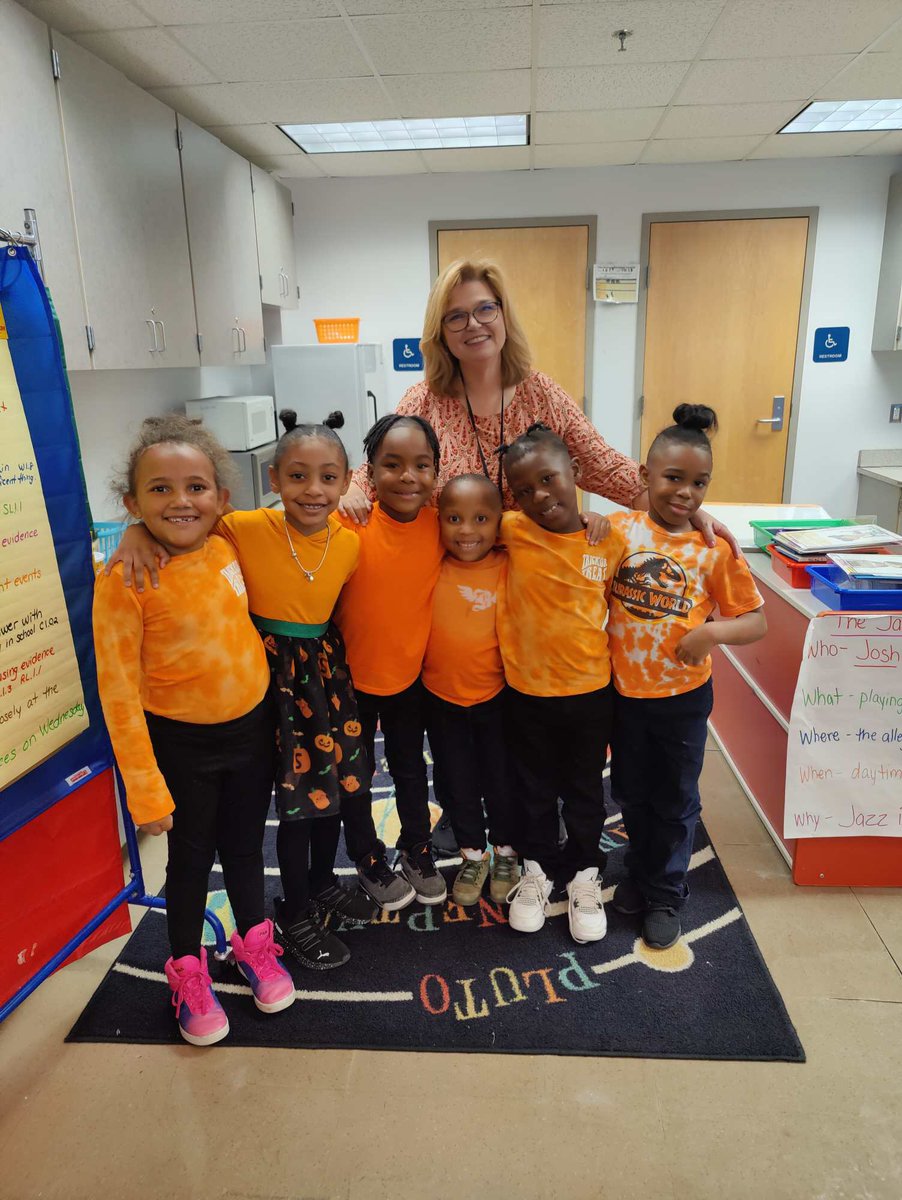 MiddleMarquette's tweet photo. Marquette Scholars shine bright, united in orange on Unity Day. https://t.co/voiowclnSB