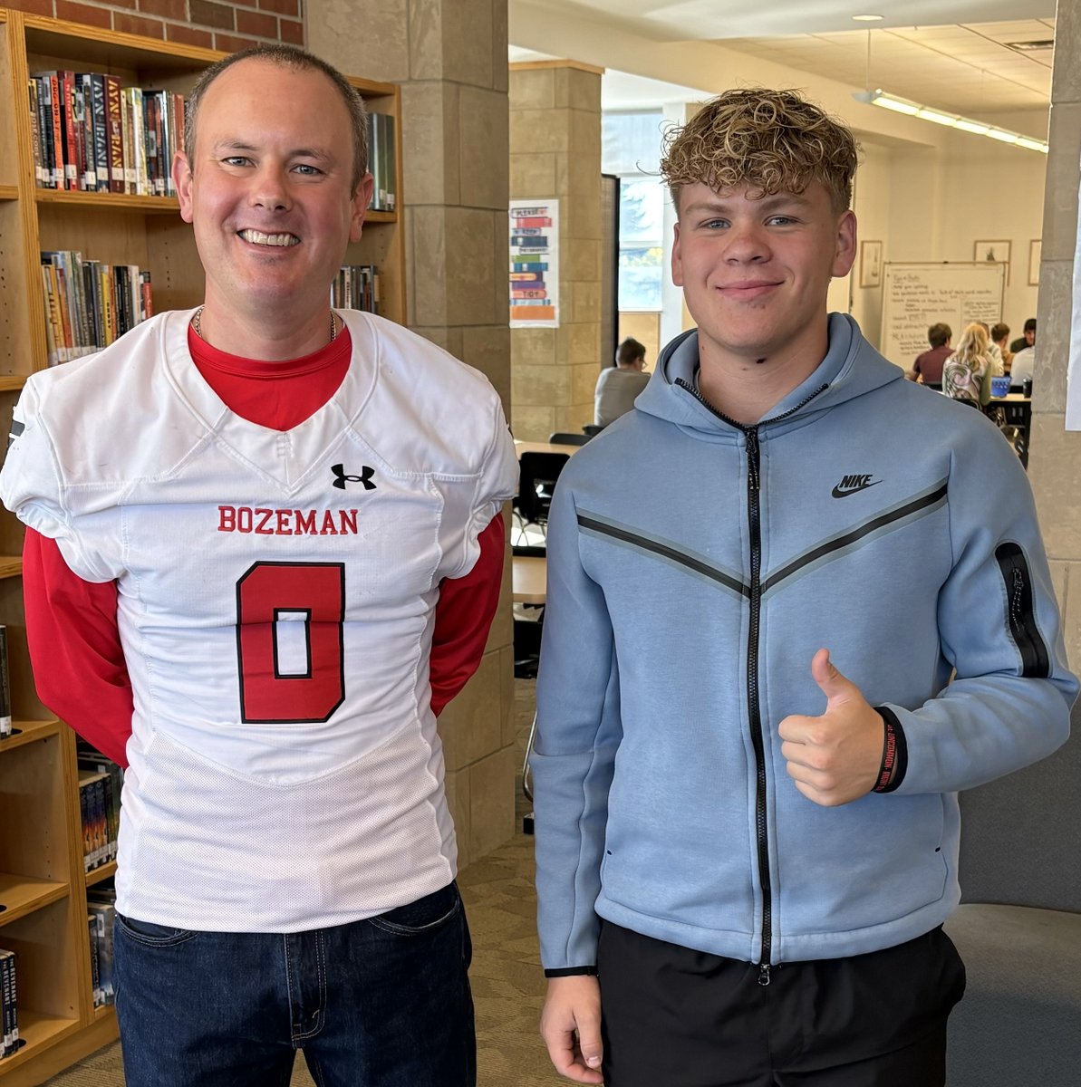 I love the tradition of Bozeman High football seniors sharing their jersey with a staff member. Thanks, Ben--I am honored to wear #0 for the day. Go Hawks!