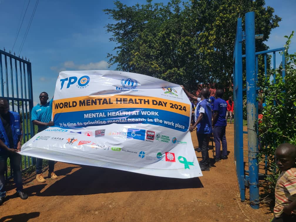 TpoUg's tweet photo. Commemoration of #worldmentalhealthday #wmhd2024 continues across @TpoUg field locations with an emphasis on prioritizing #MentalHealth in the work place. We share some highlights from #KyangwaliRefugeeSettlement where staff joined #MHPSS partners #30YearsofTransformingLives https://t.co/p0fxO0FFXy